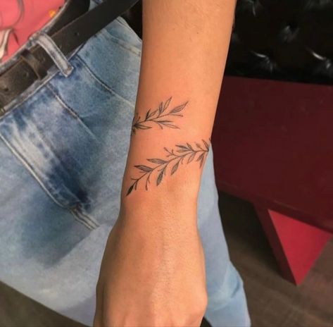 Dainty Small Arm Tattoos, Floral Tattoo Design Wrap, Olive Branch Tattoo Arm Wrap Simple, Wrap Around The Wrist Tattoos, Minalistic Tattoos, Rap Around Tattoo Arm, Wrist Wrap Around Tattoos, Wrist Vine Tattoos, Olive Branch Tattoo Arm Wrap