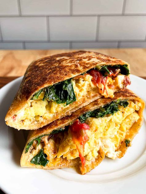 Spinach, Feta & Egg Wrap (Starbucks' Copycat Recipe) - Cook Fast, Eat Well Eggs Wraps Recipes, Starbucks Spinach Feta Wrap Recipe, Spinach Egg Wrap Recipe, Egg Wrap Ideas, Egg Feta Breakfast, Spinach Egg Wrap, Starbucks Egg White Spinach Feta Wrap, Feta Egg Wrap, Egg Life Wrap Recipes