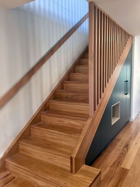 Slatted Wood Staircase, Stairs With Under Storage, Timber Batten Stair Balustrade, Stair Railing Basement, Stairs With Slats, Modern Staircase With Storage, Modern Basement Stairs, Staircase Slats, Staircase Balustrade Ideas