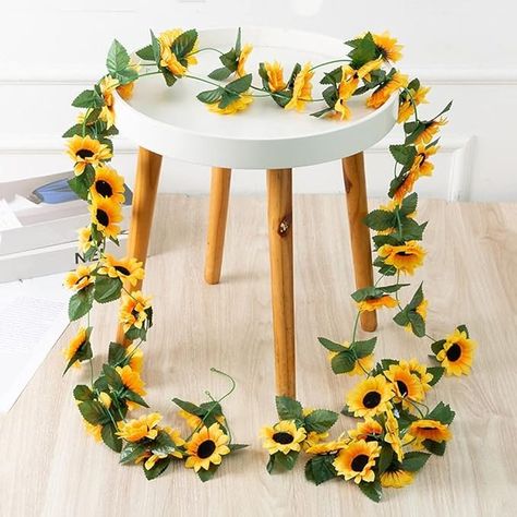 Amazon.com: 2 Pack Artificial Sunflower Garland Silk Sunflower Vine Artificial Flowers Green Leaves Fabric Floral Head Fake Sunflowers Vine for Wedding Table Home Craft Party Decoration : Home & Kitchen Sunflower Decorations, Sunflower Garland, Hanging Vines, Wedding Wall, Leaf Flower, Floral Craft, Yellow Sunflower, Flowering Vines, Floral Vine