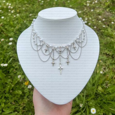 🤍White🤍 New handmade necklace made of white beads and a star pendant ! 🌝 (Check my Vinted : momoperception) • • • • • SEO : handmade necklace, artisan jewelry, beaded necklace, handcrafted jewelry #HandmadeNecklace #ArtisanJewelry #BeadedNecklace #HandcraftedJewelry #EthicalFashion #HandmadeWithLove #UniqueJewelry #JewelryDesigner #FashionAccessories #GiftIdeas #HandmadeGift #StylishJewelry #ElegantStyle #CraftedWithCare #JewelryAddict Wedding Jewelery, Diy Jewelry Earrings, Beaded Necklace Designs, Beaded Necklace Diy, Necklace Ideas, Handmade Jewelry Tutorials, Jewelry Beaded, Handmade Wire Jewelry, White Jewelry