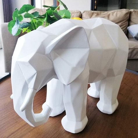 PRICES MAY VARY. Top Quality: This Home Decor is made from high quality polyresin, Relative to ceramics, Polyresin decoration is more durable, more three-dimensional, elegant and beautiful; The White Elephant Size: Approx 10*5.3*8" Inch / (25*13.5*20cm); Anti-breakage packaging: All of our Polyresin ornaments are made with exquisite anti-breakage packaging and anti-breaking foam inside, ensuring that every ceramic piece can reach the customer in perfect condition. Best Home Decor: This Originali Animals Sculpture, Elephant Decoration, Geometric Elephant, China Crafts, Geometric Origami, Elephant Ornament, Geometric Sculpture, Elephant Sculpture, Concrete Home