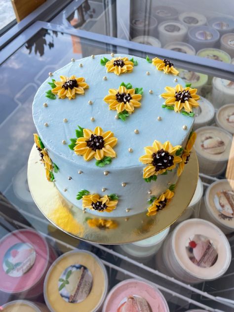 Custom sunflower cake Blue Cake With Sunflowers, Cake Designs Sunflower, Sunflower Birthday Cake For Women, Cake Decorating Ideas Funny, Cake Designs Fall, Sunflower Smash Cake, Sunflower Cake Birthday, Sunflower Cake Ideas, Sunflower Desserts