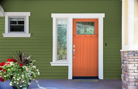 Top 22 Front Door Colors to Complement Your Green House Perfectly! House With Black Front Door, Houses Painted Green, Dark Green House, Brown Front Door, Orange Doors, Coral Front Doors, House Doors Colors, Exterior Front Door Colors, Grey Front Door