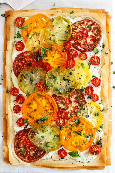 Tomato Ricotta Phyllo Tart Recipe -- An easy, fresh and flavorful phyllo tart with flaky pastry layers, chopped herbs, fresh heirloom tomatoes and a ricotta spread. girlversusdough.com @girlversusdough #girlversusdough #appetizer #easydinner Phyllo Tart, Tomato Tart, Tomato Pie, Mango Salsa, Tomato Recipes, Tart Recipes, Veggie Dishes, Tortellini, Vegetable Dishes