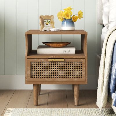 Lightly distressed with an air of industrial history, this lovely nightstand is a beautiful tribute to the past with a distinctly organic feel. Natural wood knot variations may apply. The warm natural finish with the cane-like mesh-panel woven fronts gives it an extra pop of cabin-worthy style, while the open cubby and spacious drawer add essential functionality. | Sand & Stable™ Nador Rustic Farmhouse Woven Fronts Nightstand, One Drawer End Table w / Open Shelf Wood in Brown, Size 22.0 H x 18.1 Shelf Wood, Wingback Headboard, Rustic Farmhouse Style, End Tables With Storage, Wood Nightstand, Open Shelf, Metal Beds, Menu Furniture, Upholstered Beds