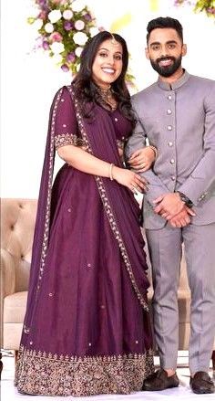 Lehenga Matching Men Dress, Couple Combination For Wedding, Dark Green Lehenga Designs, Groom And Bride Color Combination, Wine Colour Couple Outfit Indian, Bride Groom Color Combination Indian, Bride And Groom Colour Combination, Reception Couple Outfit, Reception Dress For Bride And Groom