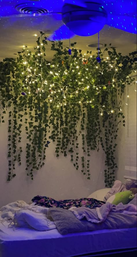 Moss Room Ideas, Mystical Living Room Ideas, Vines And Twinkle Lights Bedroom, Pandora Avatar Room Ideas, Pandora Room Ideas, Wisteria Aesthetic Room, Vines And Flowers On Ceiling Bedroom, Fake Vine Canopy Over Bed, Vines In Bedroom With Led Lights