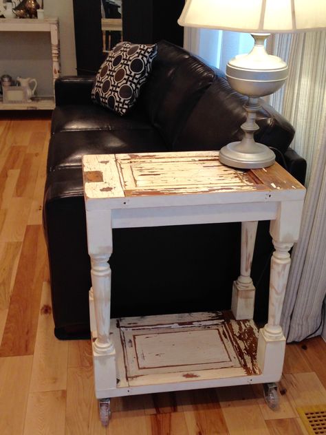 Fun and functional end table by Junk Chic 5280. Side table is made from salvaged vintage door and spindles.  Original chippy paint. Best part......on casters.  Coming to Vintage Whites Market in Denver, Colorado 2017. End Tables Repurposed, Wooden Kitchen Chairs, Diy End Tables, Vintage Side Table, Diy Furniture Renovation, Chippy Paint, Diy Home Furniture, Door Panels, Kitchen Furniture Design