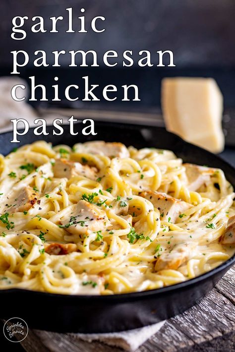 This Garlic Parmesan Chicken Pasta is a great family meal that can be on the table within 30 minutes. Tender chunks of chicken and spaghetti smothered in an irresistible creamy garlic parmesan sauce. It's a dish that screams comfort food. Pair this pasta dish with some crusty bread, a simple side salad, or veggies, and you have a delicious, easy weeknight dinner that will become a sure family favorite. Chicken And Spaghetti, Simple Side Salad, Garlic Parmesan Chicken Pasta, Parmesan Chicken Pasta, Creamy Garlic Parmesan Sauce, Garlic Chicken Pasta, Garlic Parmesan Pasta, Garlic Parmesan Sauce, Chicken Spaghetti Recipes