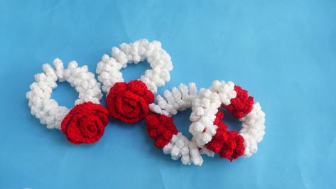 "Crochet gajray/Hand scrunches/Garland  Hello everyone! Today I will teach you some beautiful pattern like gajra, scrunches with jasmine crochet flowers and rose pattern, like the pattern as we work garland,These oversized accessories are colorful, fun, I have a super simple Crochet Scrunches we its gajray version here for you! You will need any of wool double knit medium weight or other you have for both pattern gajray, its can be easily to change any other sizes smaller or baggers’ like it Crochet Jasmine Flower, Crochet Scrunches, Hand Gajra, Jasmine Crochet, Oversized Accessories, Flower Gajra, Crochet Mens Hat, Thanksgiving Crochet, Crochet Butterfly Pattern