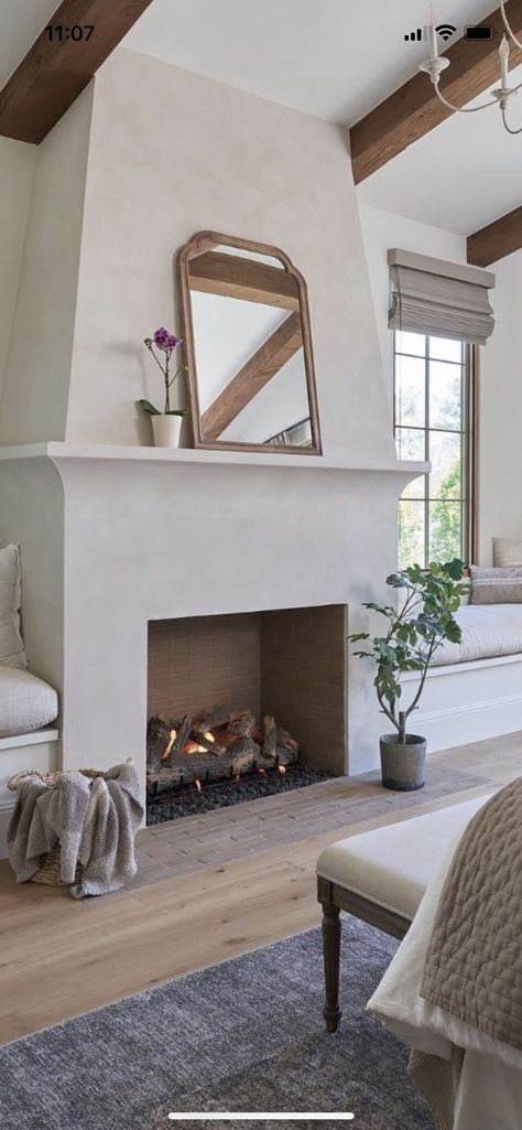 Cast Stone Fireplace Ideas, Tile Under Fireplace, Stucco Electric Fireplace, Meditteranean Fireplace, Spanish Fireplace Mantle, Architectural Digest Fireplace, Minimalist Spanish Interior, French Modern Fireplace, California Casual Fireplace