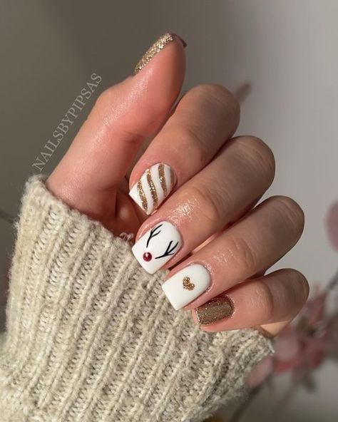 17 Festive Christmas Nail Designs for 2023 - thepinkgoose.com Reigndeer Nails, Reindeer Nails Short, Reindeer Acrylic Nails, Reindeer Nails Christmas, Rain Deer Nails, Reindeer Nails Designs, Rudolf Nails, Christmas Nails Reindeer, Reindeer Christmas Nails