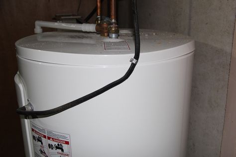 Cottage Closing: How to Winterize the Hot Water Tank | Cottage Tips Hot Water Tank, Electrical Panel, Water Intake, Relief Valve, Hot Water Heater, The Cabin, Water Systems, The Cottage, Water Tap