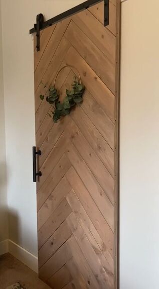 How to Build a DIY Barn Door With a Shiplap Design | Hometalk Herringbone Wood Door Diy, Herringbone Barn Door Diy, Shiplap Door Diy, Diy Barn Doors Sliding, How To Build A Door, Laundry Barn Door, Diy Exterior Barn Door, Shiplap Barn Door, Shiplap Doors