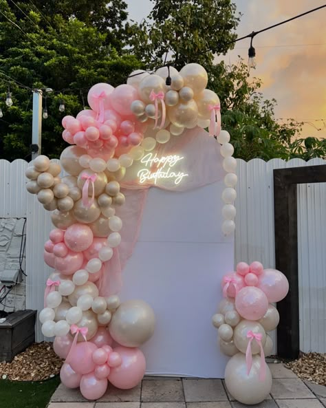 Embracing the bow life 🎀 Obsessed with how this decoration turned out 😍 during the day | during night time #balloons #birthdaypartyballoondecor #miamidecorations #coquetteaesthetic #coquettebirthdayparty #bowballoons #pearlsballoons #girlbirthdayparty #pinkballoongarland Birthday Deco Simple, Coquette Backdrop Birthday, Boots And Bows Birthday Party Ideas, Simple Decor For Birthday, Coquette Balloon Garland, Cute Balloon Arch, Pink Bow Balloon Arch, Pink Bow Decorations, Coquette Birthday Decor