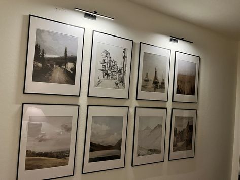 Long Wall Photo Display, Gallery Wall Living Room With Lights, Lights Above Picture Frames, Photo Gallery Wall Ikea, Portrait Wall With Lights, Diy Gallery Wall Lighting, Gallery Wall Black Frames With Lights, Lights Above Gallery Wall, Modern Wall Photo Display