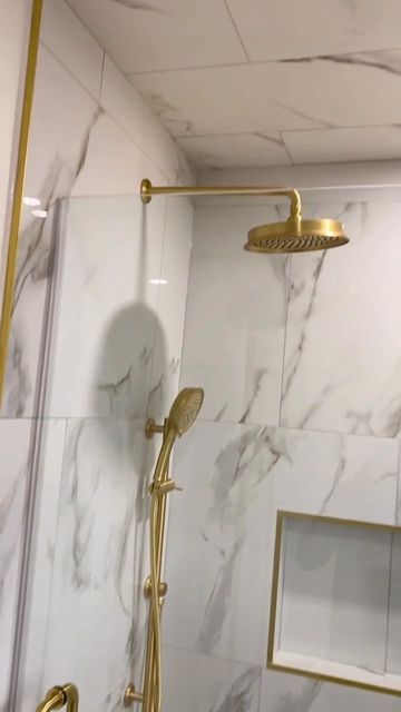 Vogt • Kitchen & Bath Fixtures on Instagram: "Dripping in Gold. Bathroom remodel by @newellsquality Featured Collection: Zehn Featured Finish: Brushed Gold #Vogt #Bathroom #BathroomRenovation #Bathroom #Shower #ShowerDesign #ShowerRenovation" Shower With Gold Accents, White Gray Gold Bathroom, Gold Restroom Decor Ideas, Brushed Gold Shower Fixtures, Cream And Gold Bathroom Ideas, Bathroom Gold Fixtures, Brushed Gold Bathroom Fixtures, White Gold Bathroom, Gold Shower Fixtures