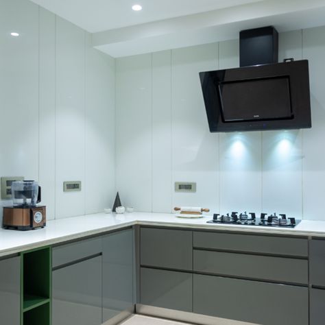 A kitchen to match a grey-themed house pulls out all the stops when it comes to ease of use. The clever design combines the chosen colour with bursts of colour and classic white to create a top-notch kitchen that enables a variety of ages to comfortably use the space. The inbuilt OTG was designed to be a talking point beside the fridge that fits in discreetly for a classic overall look. Pop Ceiling, Concept Kitchen, Pop Ceiling Design, Kitchen Time, Kitchen Solutions, Kitchen Interior Design Modern, Best Kitchen Designs, Kitchen Concepts, Modern Kitchens