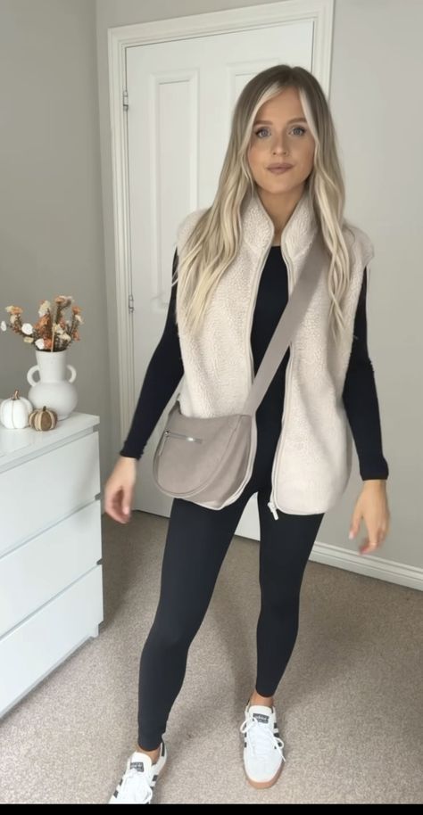 Oversized White Vest Outfit, Grey Gilet Outfit Women, Sheep Vest Outfit, Oversized Tan Vest Outfit, White Winter Vest Outfits, White Crop Vest Outfit, Cream Gilet Outfit Women, Cream Sherpa Vest Outfit, White Fuzzy Vest Outfit