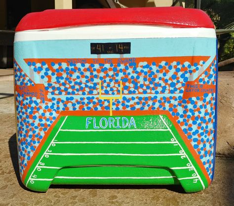 University of Florida stadium painted cooler #paintedcooler #floridagators #itsgreatuf Frat Cooler Football Field, Uga Frat Coolers, Easy Cooler Painting Ideas, Painted Frat Cooler Ideas, Nola Cooler Ideas, Myrtle Beach Frat Cooler, College Cooler Painting, Formal Cooler Ideas Fraternity, Frat Painted Cooler