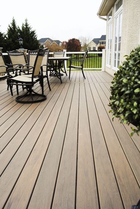 Deck color with taupe houses  #deckskirtingideas #deckideas #CompositeDecking #CompositeDeck #DeckingSystem #Deckstore Deck Color Schemes, Solid Stain Deck, Deck Paint Colors, Composite Decking Colors, Deck Stains, Deck Upgrade, Deck Stain Colors, Outdoor Deck Decorating, Deck Renovation