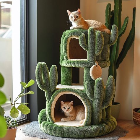 The Cactus Cat Tree is a playful and stylish piece of pet furniture designed to bring a touch of the desert into your home. Shaped like a tall, vibrant green cactus, this cat tree features multiple levels for climbing, perching, and lounging, with cozy platforms covered in soft, durable fabric. The ‘branches’ of the cactus serve as scratching posts wrapped in natural sisal, perfect for your cat’s scratching instincts. The Cactus Cat Tree not only provides endless entertainment and comfort for... Cat Scratching Post Aesthetic, Cute Cat Scratching Post, Aesthetic Cat Furniture, Diy Cat Tower Easy Cheap, Themed Cat Tree, Cat Jungle Gym, Flower Cat Tree, Cat Homes, Diy Cat Tower