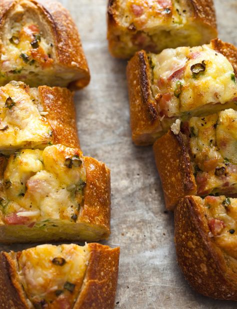 I can not wait to make these again.  I made them one morning for a house full of company and everyone raved about them!  These egg boats are the most delicious savory breakfast treat!  The outside is crusty and crispy, while the inside is soft and custardy...YUM!  The best part is that you can flavor them with whatever you want. Egg Boats, Spoon Fork Bacon, Baked Egg, Deli Sandwiches, Snacks Für Party, Breakfast Of Champions, Baked Eggs, French Bread, Spoon Fork