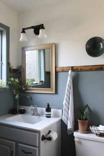 A $0 Bathroom Makeover Transformation! Basement Bathroom Paint Ideas, Bathroom Color For Small Bathroom, Industrial Bathroom Paint Colors, Painting Ideas For Small Bathroom, Bathroom Decor Dark Blue, Dual Color Bathroom Walls, Blue Wall Bathroom Ideas Paint, Small Bathroom Color Schemes Farmhouse, Small Bathroom Repaint