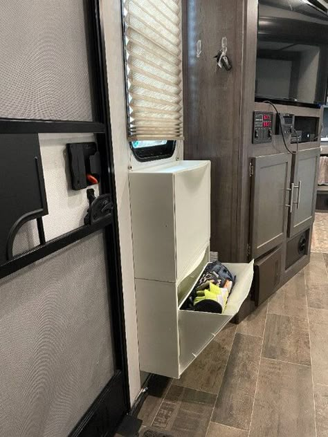 Rv Storage Clothes, Rv Boot Storage Ideas, Camping Trailer Storage Ideas, Shoe Storage Rv Travel Trailers, Camper Hidden Storage, Under Camper Storage, Adding Storage To Camper, Full Time Rv Living Storage Ideas, Rv Living Storage Ideas