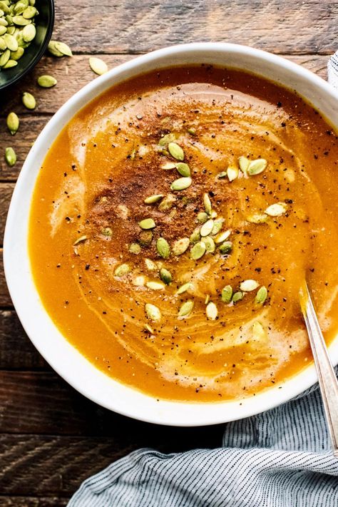 This slow cooker butternut squash soup is delicious and full of the best fall produce! We love serving this healthy vegan soup up for dinner with crusty bread and a side of greens. It is full of flavor and super cozy for chilly nights! | asimplepalate.com #vegan #butternutsquash #soup #slowcooker Autumn Squash Soup Recipe, Autumn Squash Soup, Panera Autumn Squash Soup, Autumn Squash, Homemade Vegetable Broth, Squash Soup Recipe, Fall Soup Recipes, Pureed Soup, Fall Foods