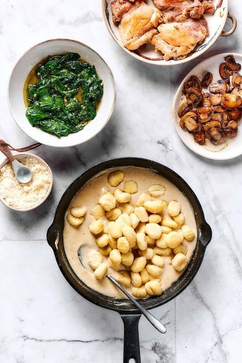 Creamy Chicken and Gnocchi is a bold, yet comforting combo of tender chicken, pillowy gnocchi, and flavorful spinach and mushrooms. A great recipe for date night or any night! Creamy Chicken And Gnocchi, Spinach Gnocchi, Chicken And Gnocchi, Gnocchi Chicken, Spinach And Mushrooms, Thigh Recipes Baked, Chicken Gnocchi, Chicken Thigh Recipes Baked, Spinach Stuffed Mushrooms