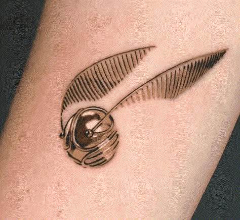 Harry Potter Golden Snitch Realistic Tattoo Tiny Harry Potter Tattoos, Golden Snitch Tattoo, Snitch Tattoo, Harry Potter Snitch, Harry Tattoos, Hp Tattoo, Harry Potter Golden Snitch, Potter Tattoo, Harry Potter Tattoos