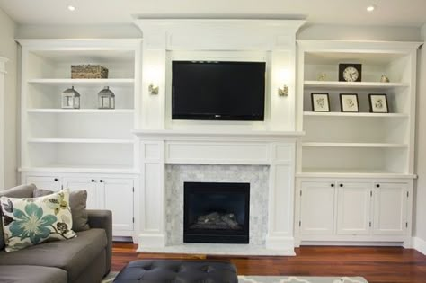 Built-in fireplace surround, elevated crown. no tv.  I like the tile around the fireplace Tv Above The Fireplace, Diy Fireplace Mantel, Built In Around Fireplace, Casa Clean, Above The Fireplace, Family Room Makeover, Fireplace Built Ins, Housing Ideas, Real Estat