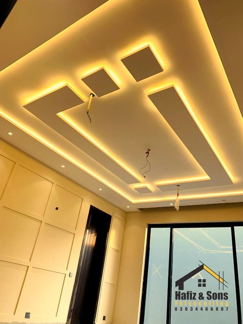 Unleash the potential of your space with our Model Design False Ceiling series. Elevate your surroundings and indulge in the artistry of design. Contact us Now 📞 03034466887 #FalseCeiling #InteriorDesign #EleganceDefined #HomeDesign #HafizAndSonsCeiling #interior #luxurydecor #luxuryhomes #homedecor #LuxuryLiving #CeilingUpgrade #designer #WallDesign #TransformYourSpace #roof #modernfalseceiling Celing Roof Design, Interiors 2024, Gypsum Board Ceiling, Best False Ceiling Designs, Pop Design For Roof, Gypsum Ceiling Design, Pvc Roofing, Simple Ceiling Design, Board Ceiling