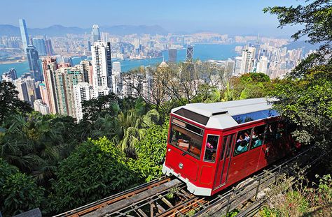 Arguably Hong Kong’s most famous attraction, Victoria Peak rises 1,805 feet above sea level and overlooks Central and the city beyond. Reaching the top requires a seven-minute ride on the Peak Tram, the world’s steepest funicular railway. On clear days you can see Kowloon’s eight mountains, but the nighttime views of both sides of the harbor illuminated is equally stunning. Hong Kong Travel Guide, Victoria Harbour, Hong Kong Island, Hong Kong Travel, The Peak, Culture Travel, Kuala Lumpur, Macau, Kung Fu