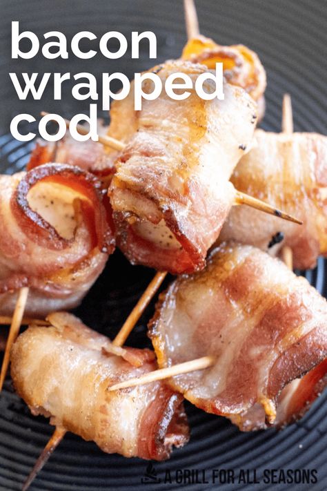 Need a simple recipe to use those cod fillets? Check out the ease of this Bacon Wrapped Cod. It's one of the best ways to cook white fish and pair it with salty bacon. This will give a whole new cooking life to this piece of fish! Bacon Wrapped Fish, Bacon Wrapped Fish Recipes, Cod Fish Appetizers, Cod Wrapped In Bacon, Fish Wrapped In Bacon, Bbq Cod Recipes Grilled Fish, Bacon Wrapped Dove Recipes, Cod Wrapped In Prosciutto, Cod In The Oven