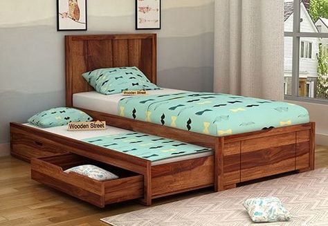 Gary Kids Trundle Bed With Storage happens to be an amazing bedstead for #kidsbedroom due to its brilliant features. First one is that it's a #trundlebed which is an obvious yes for kids then its a #bedwithstorage in form of 2 drawers beneath so adds to convenience. #shoponline this wooden trundle bed for kids at #woodenstreet Modern Trundle Bed, Kids Trundle Bed, Wooden Trundle Bed, Trundle Bed Kids, Wooden Bed With Storage, Beds With Storage, Bed Designs With Storage, Trundle Bed With Storage, Kids Beds With Storage