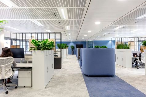 This vibrant workspace environment focusses on collaboration and wellbeing.  We were pleased to work with a top design team at this new Paris location.

The design consists of a palette of rich blues, light colours and natural plywood with hints of plants and biophilia around the space. They went with an open-plan space that allows natural light to filter through, boosting workplace productivity and improving wellbeing and skilfully zoned using furniture to create divisions without walls. Collaborative Workspace, Office Plan, Collaboration Space, Black Ceiling, Office Snapshots, Open Office, Paris Design, Workplace Design, White Ceiling