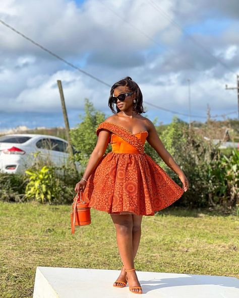 Short Traditional Dresses, Modern Traditional Dresses South Africa, Orange Traditional Dresses, Fitting Dress Styles, Isishweshwe Dresses, African Bridesmaid Dresses Traditional, Zulu Traditional Attire Umemulo, Traditional Dress Ideas, Lobola Outfits Bridesmaids