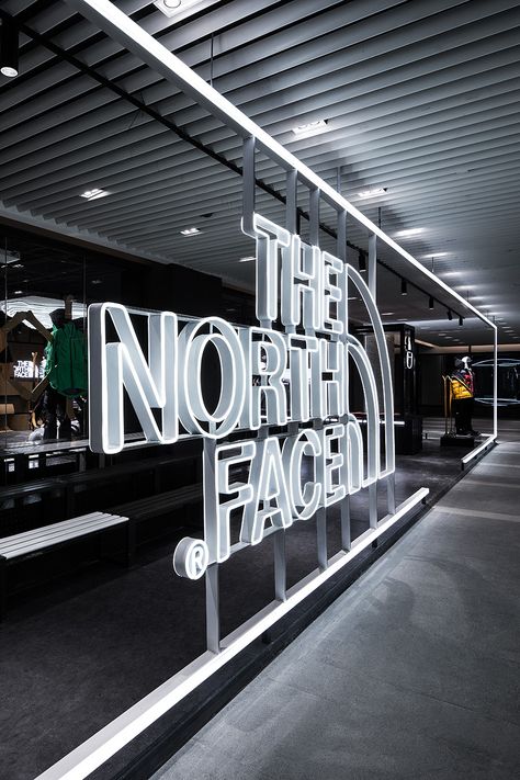 The North Face Basecamp by COORDINATION ASIA #thenorthface #tnf #retail #retaildesign #installations #coordinationasia #cooasia Logo Installation Ideas, Led Logo Design, Logo Installation, Logo Lighting, Light Signage, Logo Signage, Sign Installation, Wayfinding Signage Design, Neon Signage