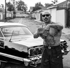 Untitled Mexican Tattoos Men, Gangsta Photos, Cholo Style Men Gangsters, Cholo Style Men, Mexican Gangster Tattoos, Chicano Aesthetic, Mexican Gangster, Cholo Tattoo, Chicano Culture