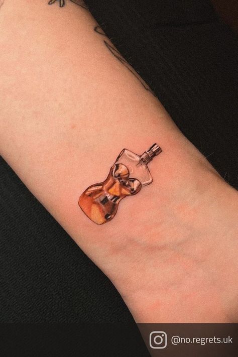 Micro realistic tattoo of Jean Paul Gaultier's Classique perfume bottle done by Romulo at No Regrets Tattoo Studio Cheltenham Perfume Tattoo, Perfume Bottle Tattoo, Tattoo Perfume, Regrets Tattoo, John Paul Gaultier, No Regrets Tattoo, Lyrics Tattoo, Lyric Tattoos, Bottle Tattoo