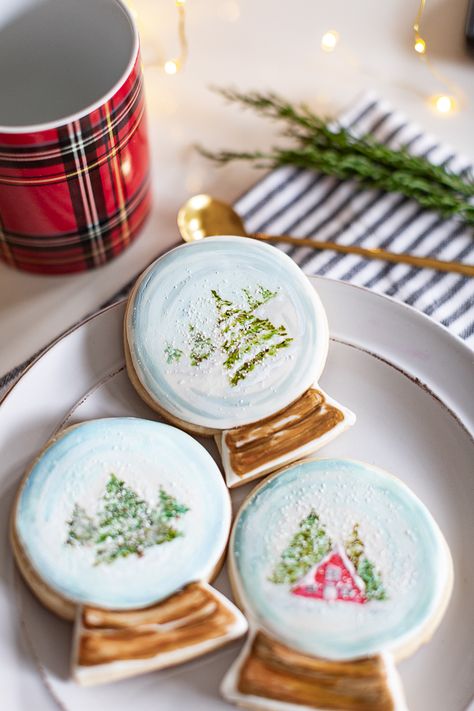 Hand-painted Snow Globe Christmas Cookies Christmas Cookies Watercolor Painting, Painted Cookies Watercolor, Hand Painted Christmas Cookies, Snow Globe Cookies Decorated, Winter Royal Icing Cookies, Snowglobe Cookies Christmas, Painted Christmas Cookies, Watercolor Christmas Cookies, Snow Globe Cookies