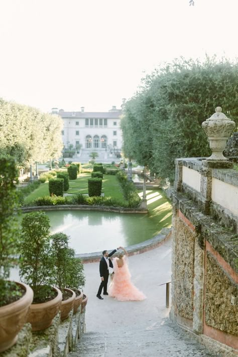 Step into the timeless allure of love at Vizcaya Museum and Gardens, Miami's ultimate wedding destination. This historic gem enchants with its lush gardens and a breathtaking villa, offering a glimpse into the past while providing the perfect backdrop for your special day. Vizcaya’s Mediterranean charm sets the stage for your wedding day, where history, art, and romance intertwine seamlessly. Get wedding details online now! Photo by Naivys Rodriguez Vizcaya Museum And Gardens Engagement, Vizcaya Museum And Gardens Photoshoot, Vizcaya Engagement Photos, Vizcaya Museum And Gardens Wedding, Vizcaya Engagement Pictures, Vizcaya Miami, Vizcaya Wedding, Vizcaya Museum And Gardens, Proposal Photoshoot