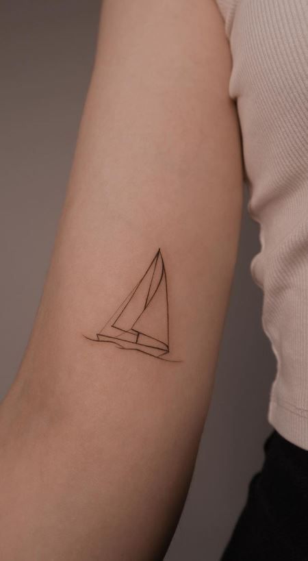 This article contains 60 fully original, distinctive, and eye-catching ship tattoo ideas. Bonus: all meanings explained. Ship Tattoo Ideas, Simple Tattoos With Meaning, Kite Tattoo, Simple Tattoo With Meaning, Sailing Tattoo, Beautiful Tattoo Designs, Sailboat Tattoo, Boat Tattoo, Raven Tattoo