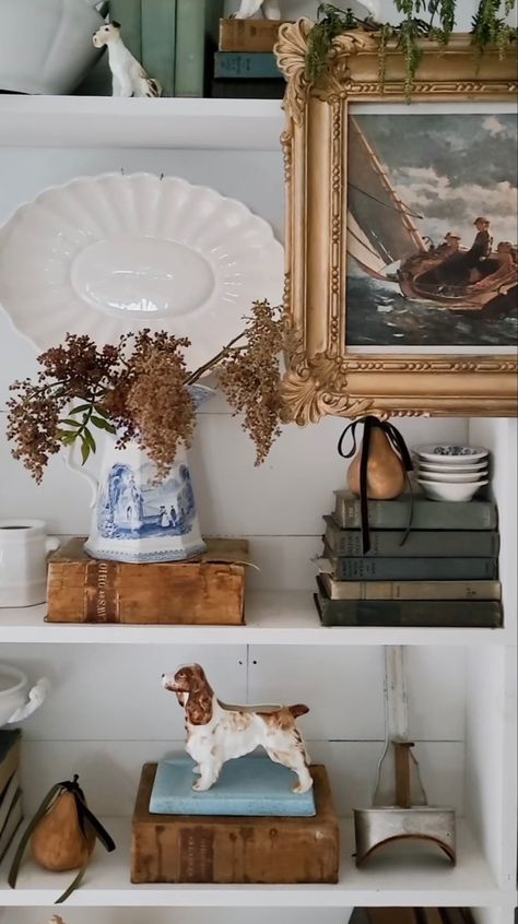 How To Display Vintage Books, Vintage Farmhouse Shelf Decor, Cottage Shelf Styling, French Country Shelf Styling, Books On Mantle Decor, French Shelf Styling, Styling Large Shelves, French Country Bookshelf Ideas, Traditional Bookshelf Styling