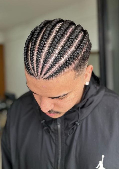 Faded cornrows are one of the most popular styles, ideal if you’re growing out the top portion of your hair. Make sure to keep your hair conditioned by using hair conditioners for men. Men’s Cornrows Fade, Braids For Men Curly Hair, Cornrow Hairstyles On Men, Faded Cornrows Men, Men’s Braids Top, Short Hair Men Braid Styles, Hairstyles For Men With Short Hair, Braids For Men 4c Hair, Braids For Men With Fade Short Hair