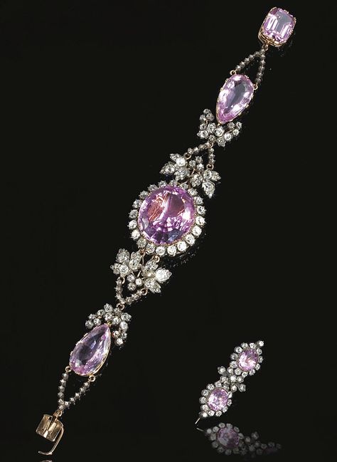 RARE PINK! TOPAZ AND DIAMOND BRACELET, CIRCA 1830. The central oval pink topaz set within a border of old-mine diamonds, on an articulated bracelet set with two pear-shaped pink topaz, interspersed with vine leaf motifs set with circular- and rose-cut diamonds, the detachable clasp set with a cushion-shaped pink topaz, accompanied by a brooch set with similar stones, Central element can be worn as a brooch. Pink Stones, Pink Topaz, Royal Jewels, Royal Jewelry, I Love Jewelry, Gems Jewelry, Diamond Bracelets, Antique Jewellery, Vintage Jewellery