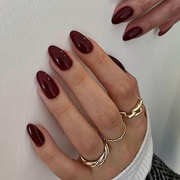 Get a sophisticated look with these 24pcs short almond press-on nails in a stunning burgundy wine red! Perfectly shaped for a natural almond or oval finish, these nails are easy to apply and designed for a secure fit. Ideal for a bold, elegant manicure anytime. #BurgundyNails #WineRedNails #PressOnNails #AlmondNails #NailArt Nail Merah, Nail Tricks, Nails Solid, Almond Press On Nails, Maroon Nails, Nails Glossy, Eyelash Extentions, Fake Nails With Glue, Burgundy Nails